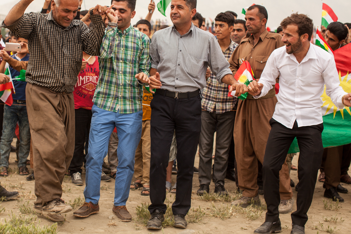  Kurdish men dance at a party to celebrate Kurdistan (2016). 