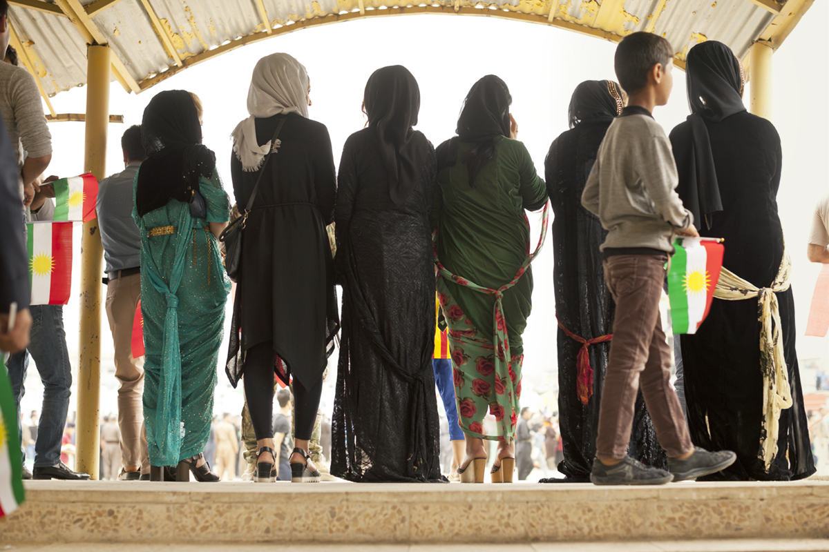  Kurds gather at a rally in support of the referendum at the local soccer stadium (2016). 