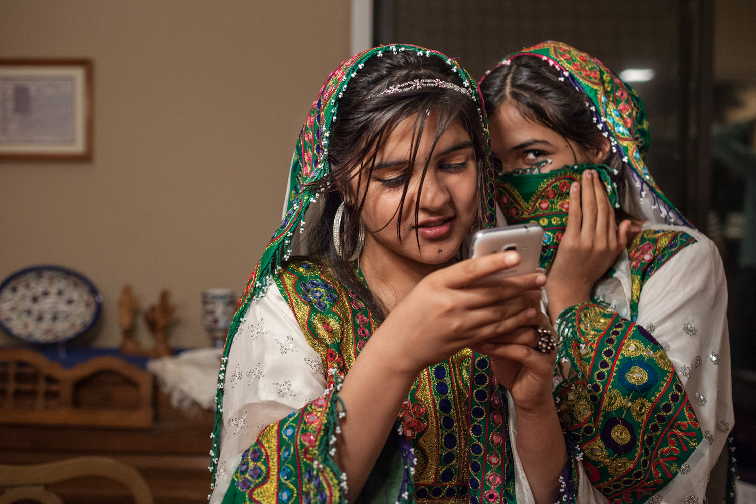  Maria and her sister, Naadia, celebrating their first American Thanksgiving after fleeing Afghanistan and coming to Georgia (November 2014). 