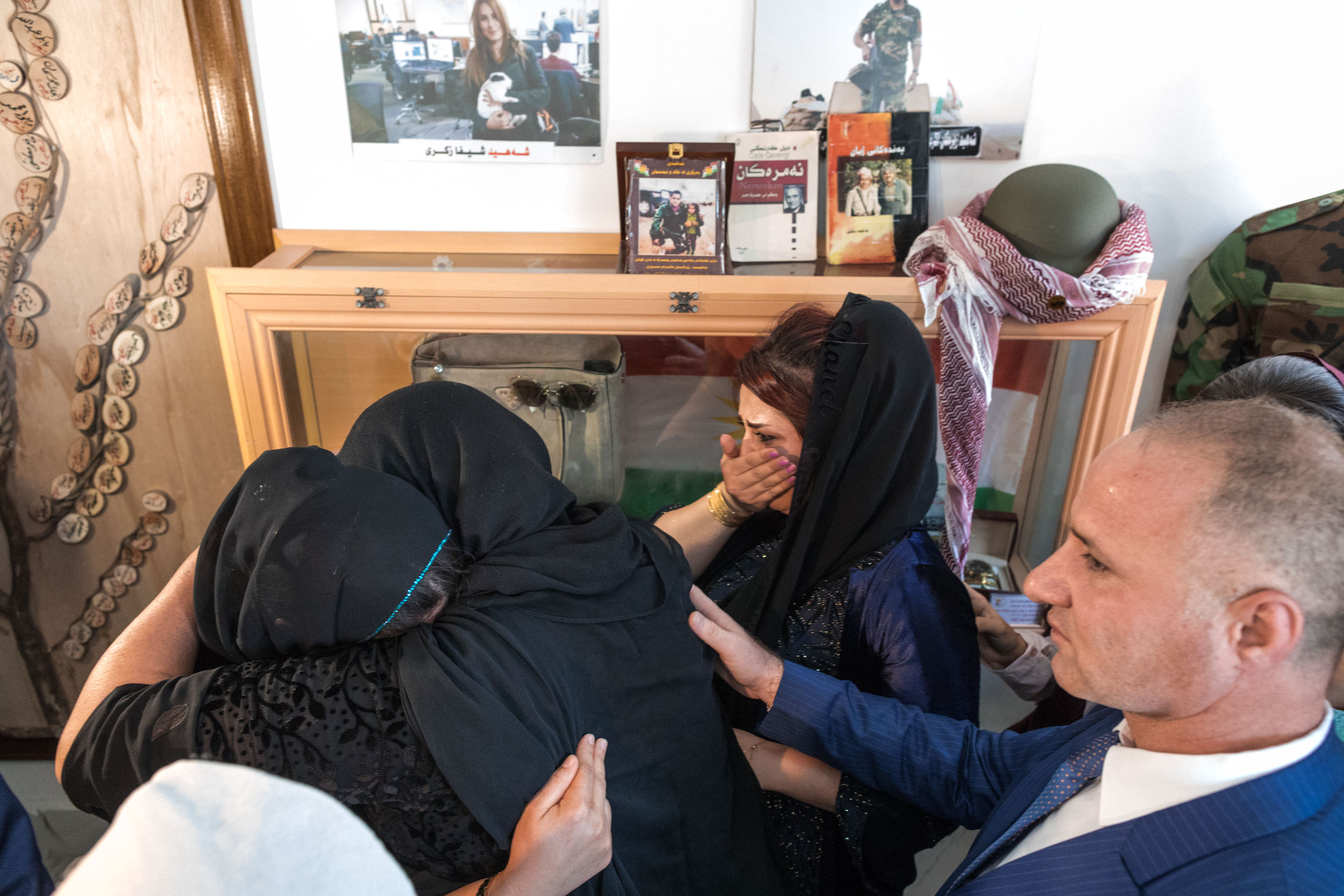  Women grieve the loss of a loved one who fought with the Peshmerga against ISIS (2017). 