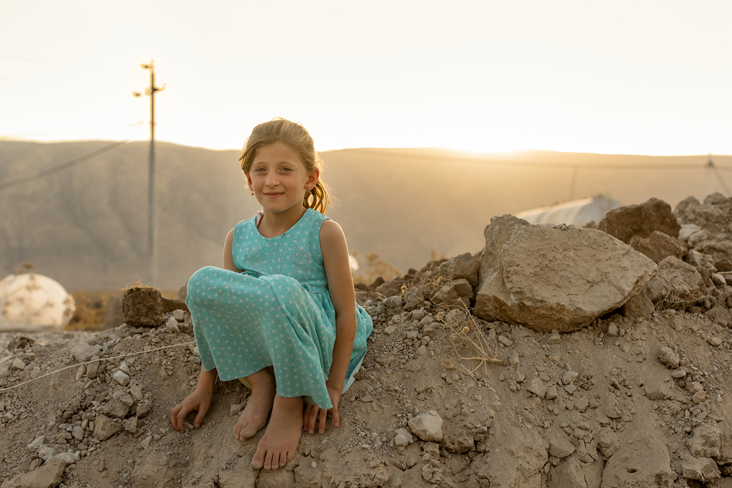  Blonde Yazidi girl at their camp in Azadi, Iraq (2017). 