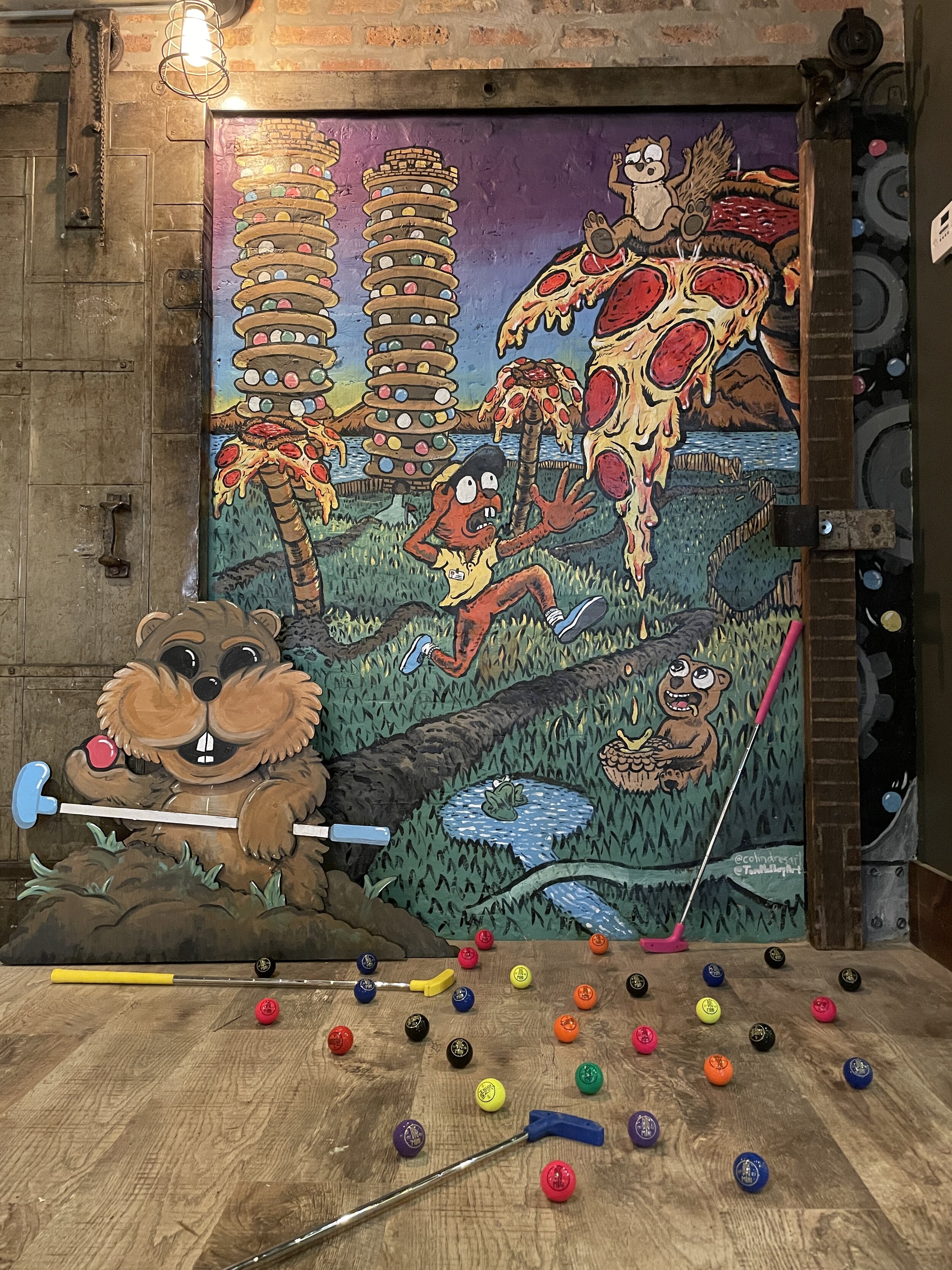  Small-scale mural painted by me for Big Mini Putt Club located in the Wicker Park neighborhood of Chicago.  Laser-cut character design by Tom Molloy. Cut by Mario Peña. 