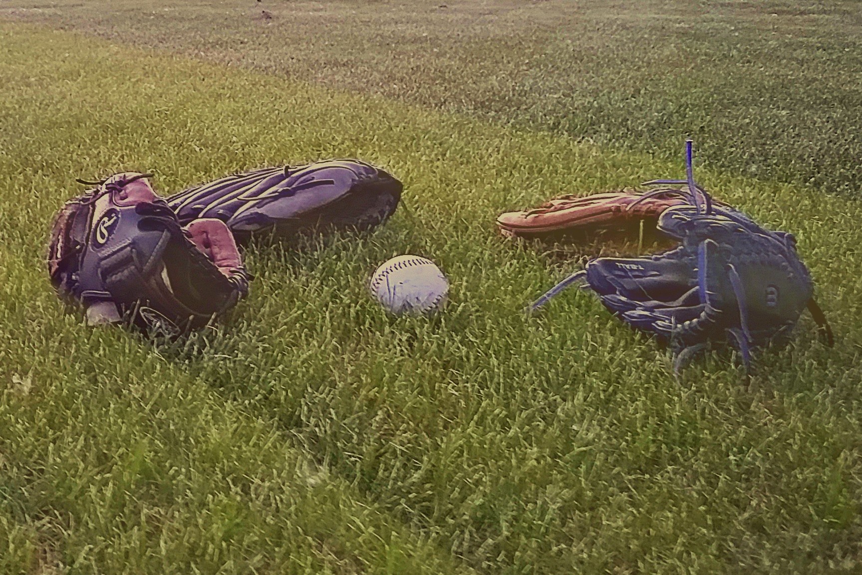 Baseball gloves and a ball formed the center.