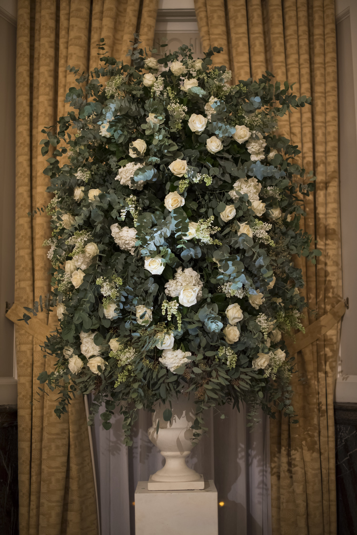 tall flower arrangement in white.jpg