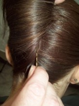 5.&nbsp; Pinning folded hair