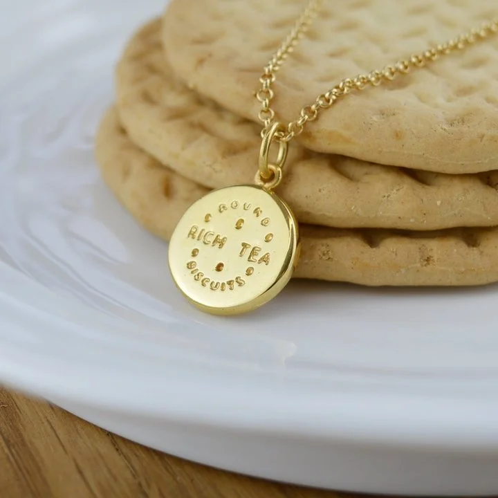 large_MASTER_Rich_Tea_Charm_Necklace_in_Gold_Editorial_CNGRT_SQUARE_84f827e7-a229-43bf-80f1-a5f9dd4aa0c3.jpg