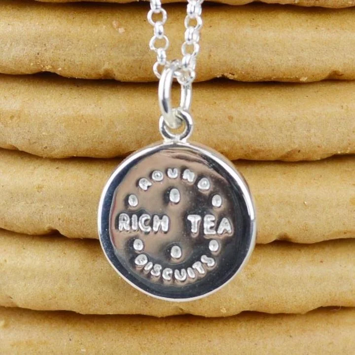large_Rich-Tea-Charm-Necklace-in-Silver-Editorial-CNSRT-CROPPED_4d39c1a6-4ab9-4ce0-a32b-339fc0c9b678.jpg