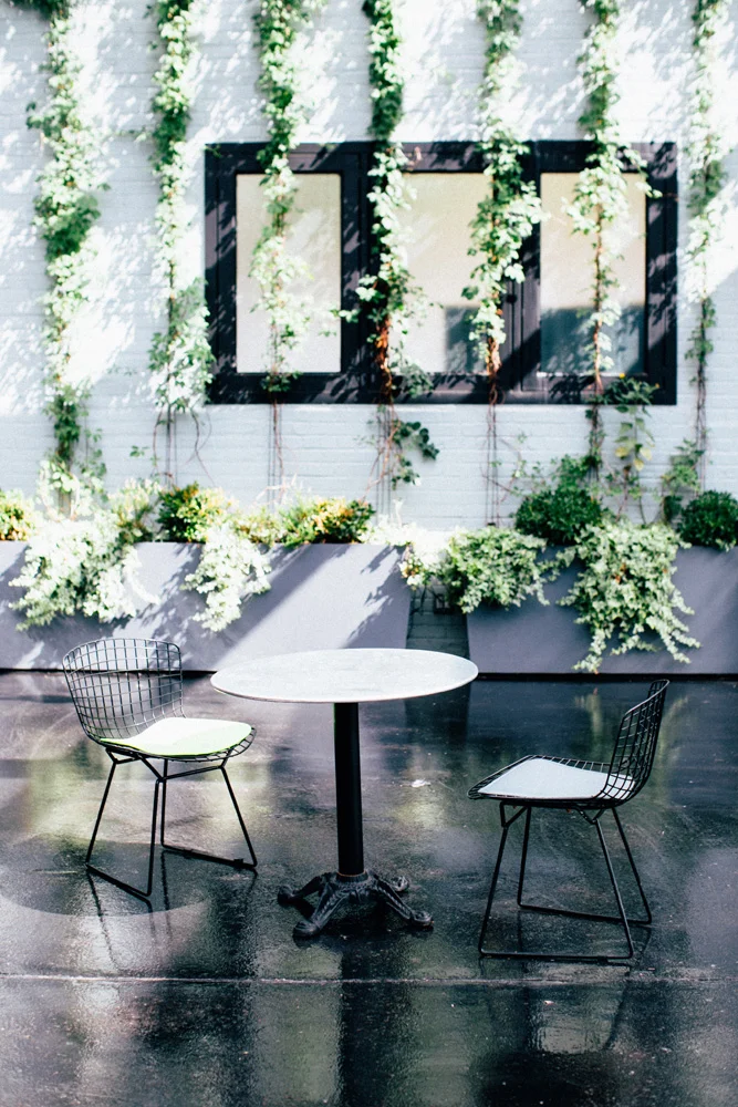 Cafe Tables (cast steel base with sheet-steel top) - $18/each, 3 available and Black Wire Café Chairs (choice of gray or lime green cushion) - $5/each, 12 available