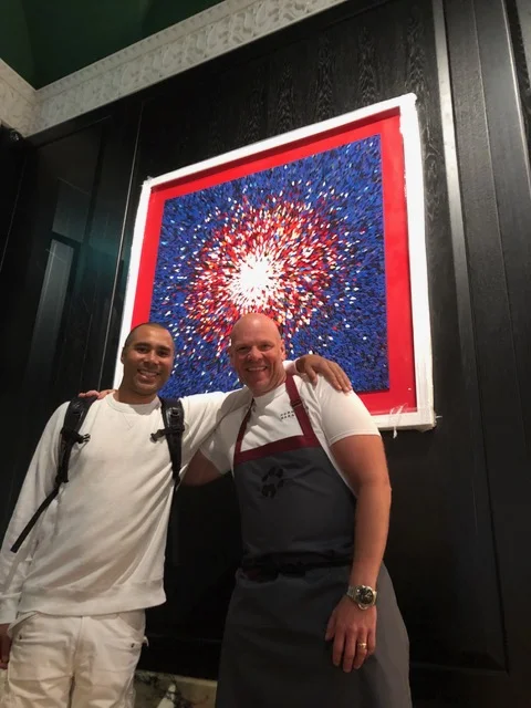 In 2017, Chef Tom Kerridge commissioned Robi to create three pieces of work for his new London restaurant Kerridge’s Bar & Grill at the Corinthia Hotel. They were made using souvenir menus from foodies around the world. Robi asked Tom to help him make the feature wall piece and it’s been so popular that they have now created a print of it. The print is now available to purchase from the online shop on this website, Robi Walters Gallery and Kerridge’s Bar & Grill.