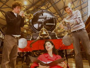 York Press, singing under a train at the National Railway Museum
