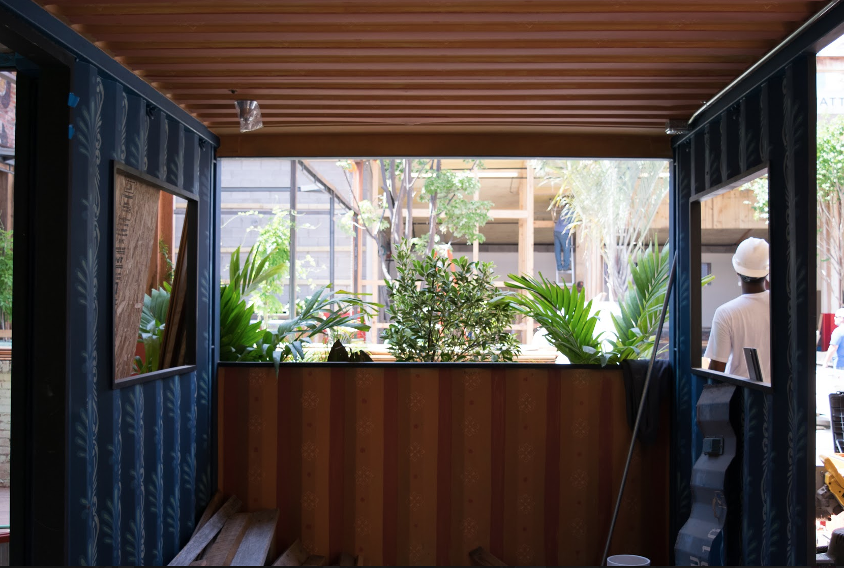 These shipping containers will be filled with furniture for a cozy spot to drink a beer (or five)