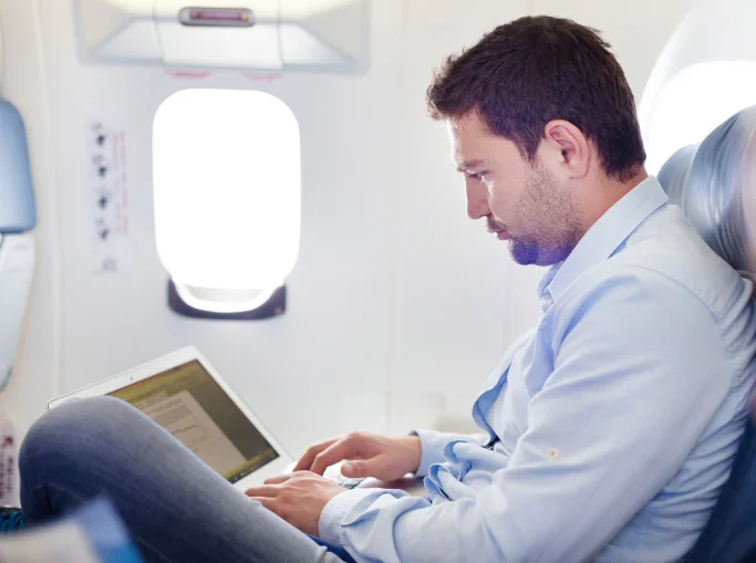 Man working on plane