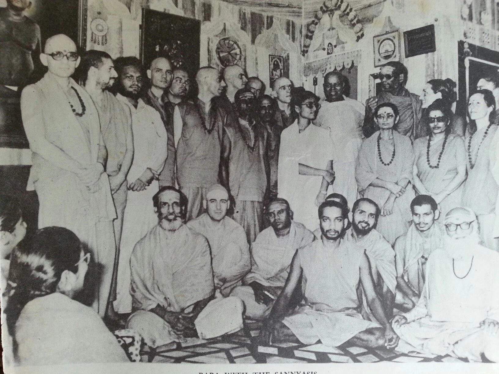 The group that took sannyas with Swamiji. Swamiji is in the back row, fifth from the left.