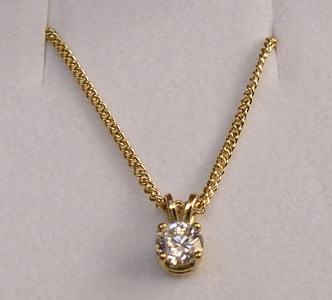 diamond-pendant-claw-set-yellow-gold.jpg