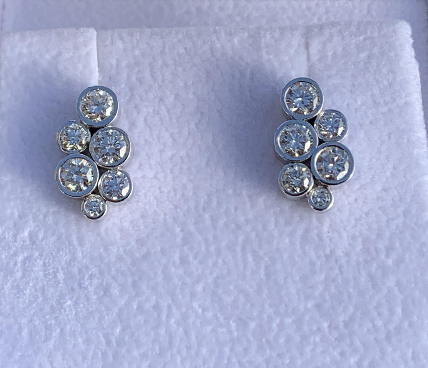 Platinum and diamond earrings. Over 1 ct each .