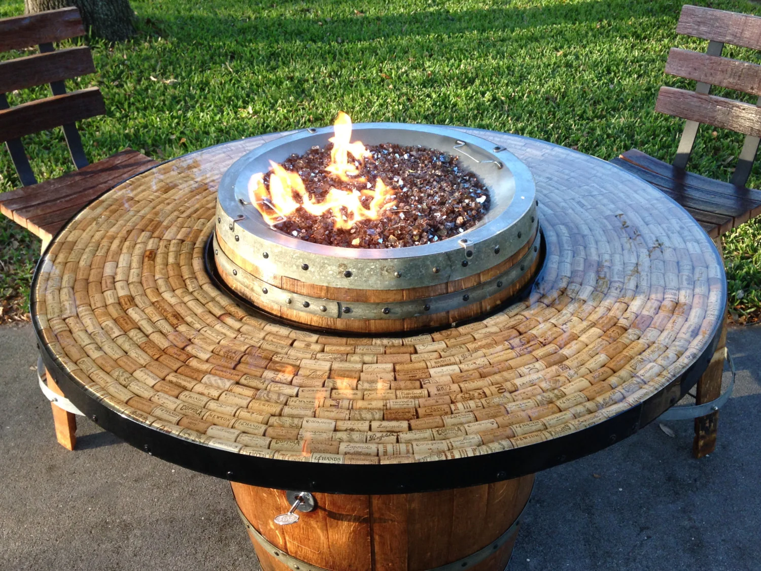 Vin de Flame Vin de Flame wine barrel fire pit tables bring the flavor of the vineyards into outdoor living spaces. Each fire pit is unique and tells its own story.
