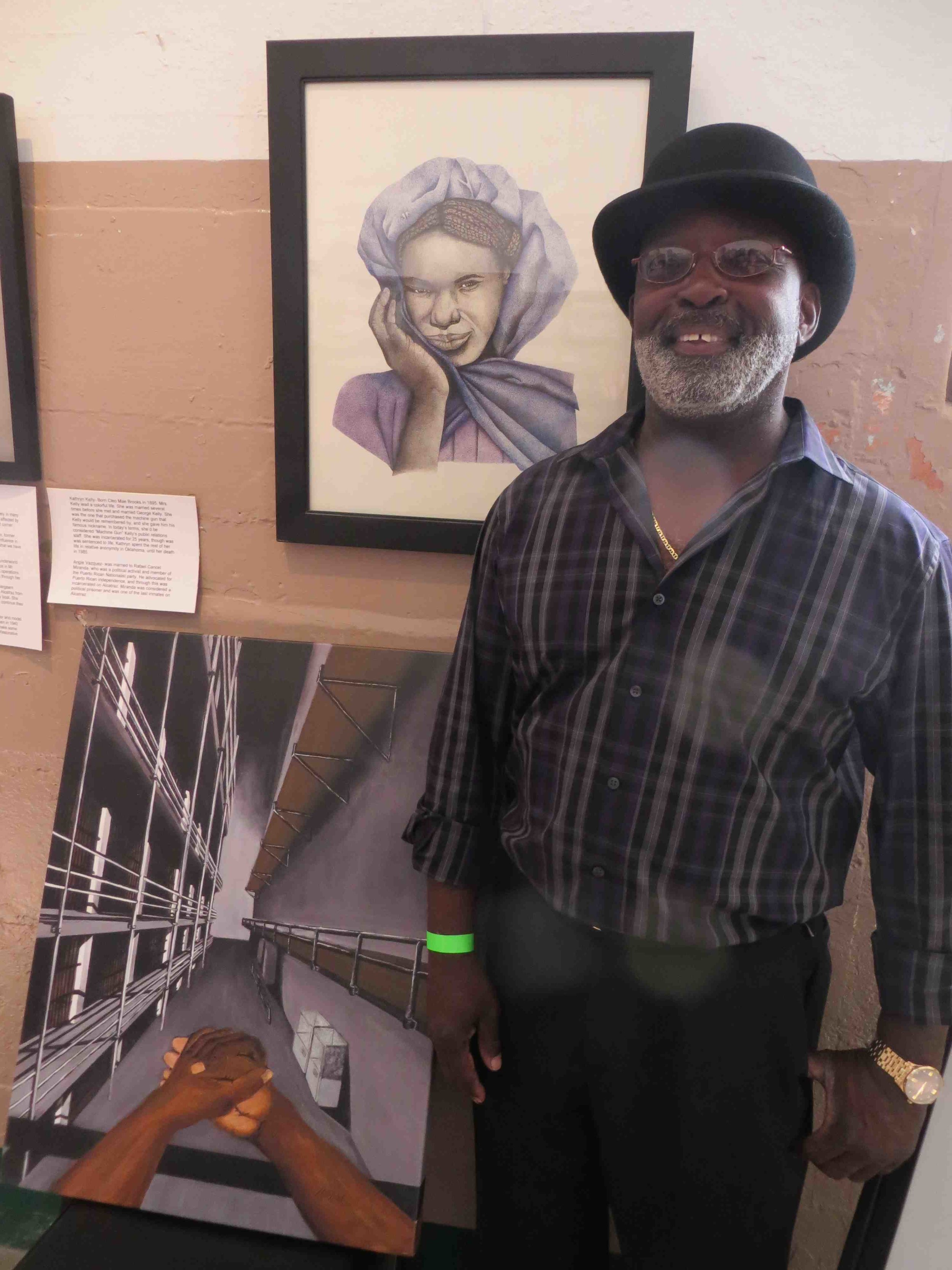 Isiah Daniels in front of his artwork at Alcatraz-006.jpg