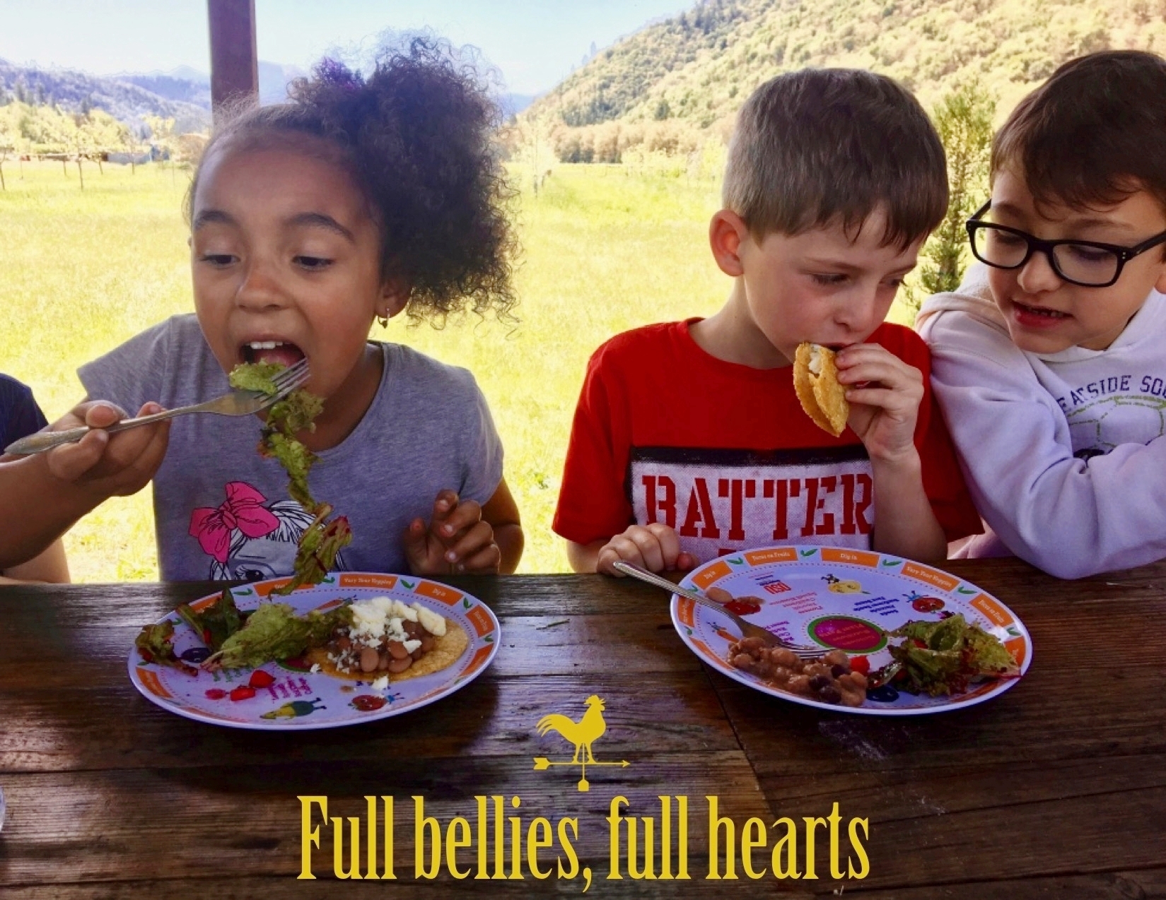 2nd graders from mae richardson enjoying the lunch they made at wandering roots farm