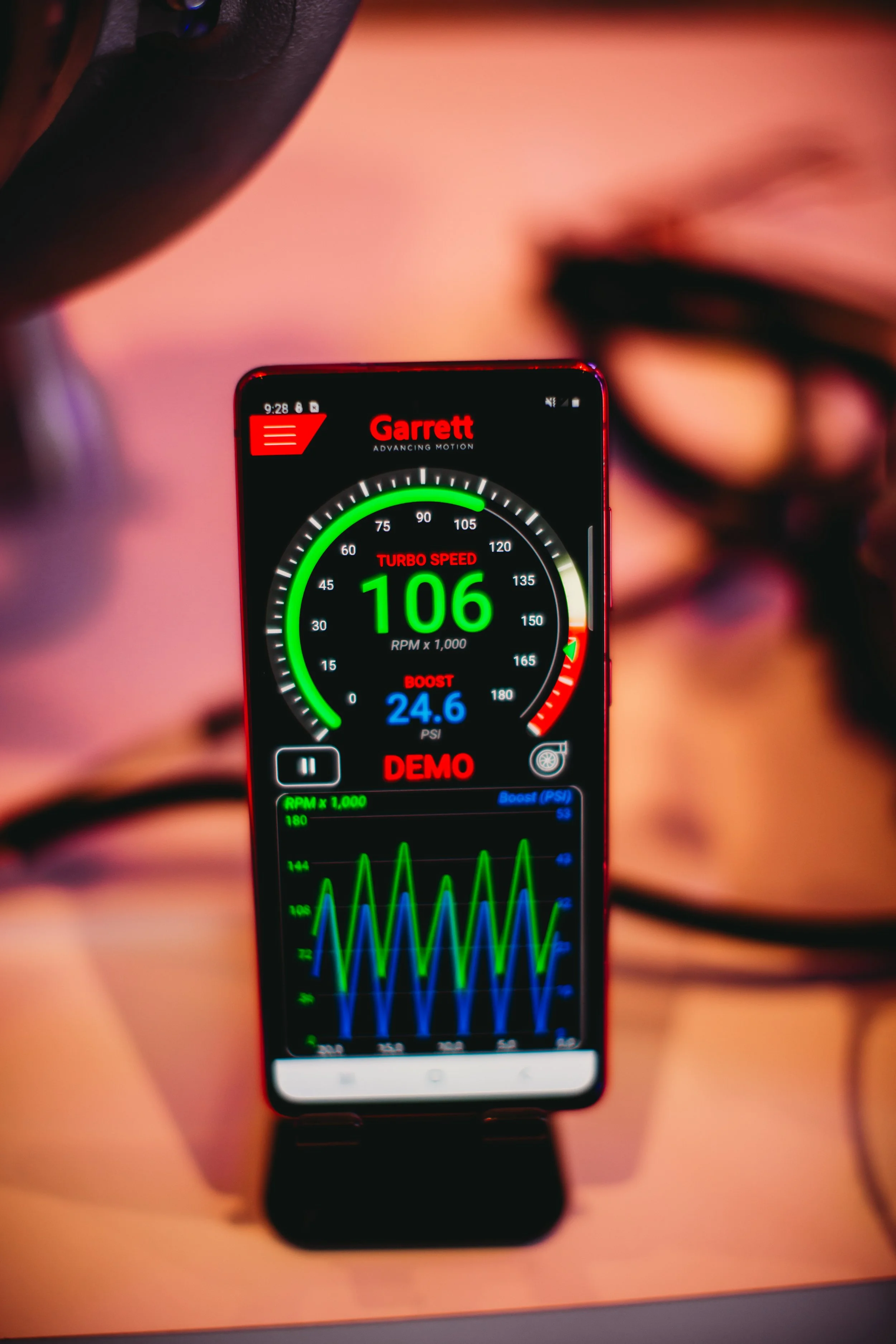 Live performance data on display at a Garrett Motion event. Natural light, 24mm