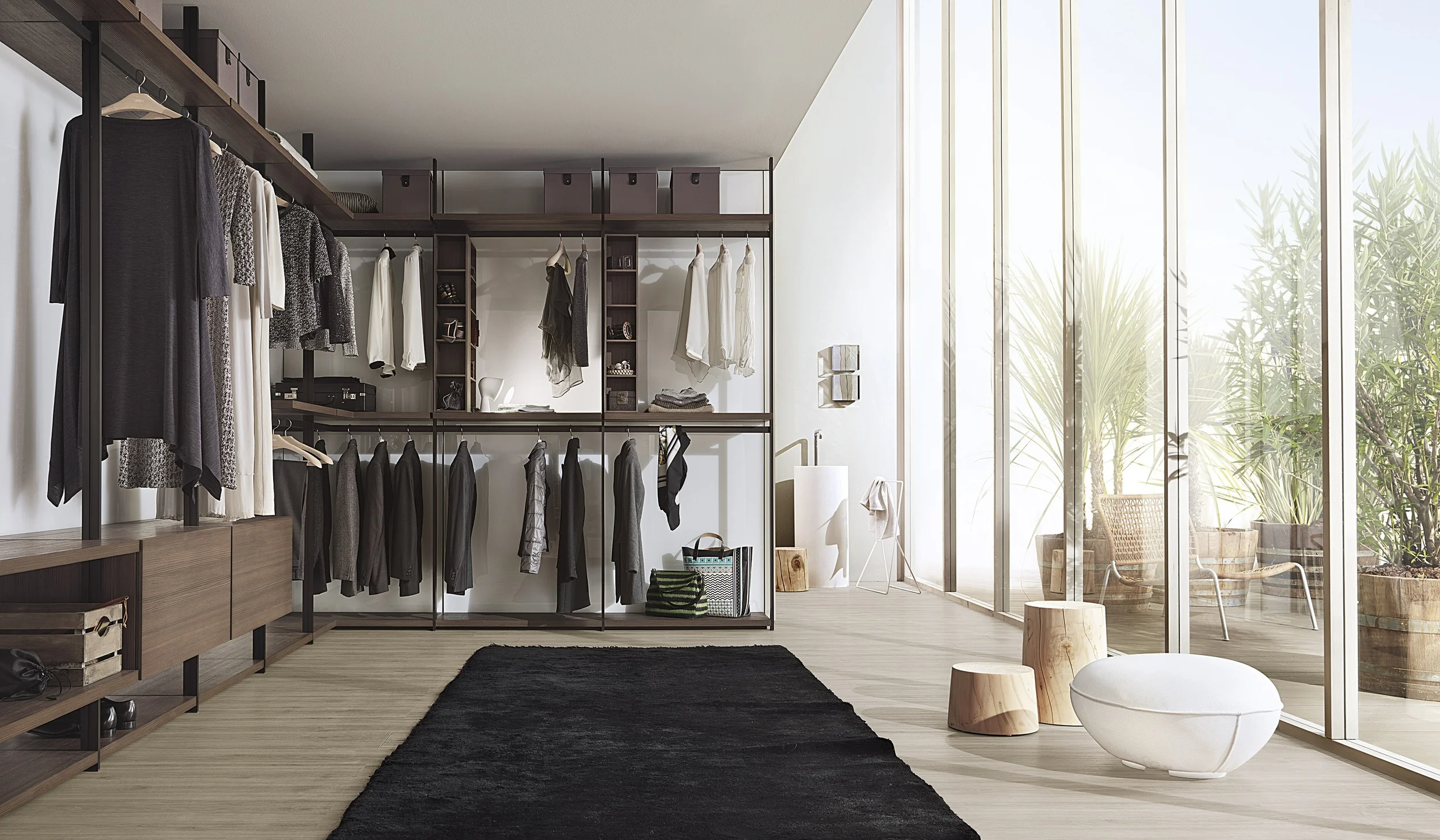 HANGAR BY LEMA Completes the historical catalogue of Lema walk-in wardrobe. Designed by Piero Lissoni, adds to the cladding panels and glass illuminated wall wooden uprights using floor / ceiling that help support the weight of the equipment and provide a quality detail.