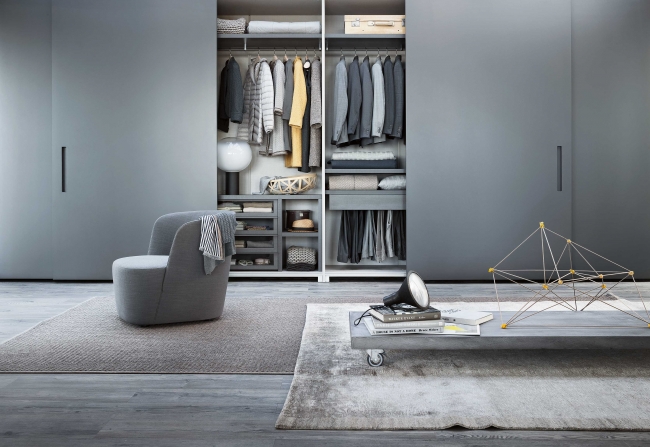 SLIDING DOORS BY LEMA Made to measure wardrobe is the modular system that offers maximum freedom of construction due to the wide range of modules available and the ability to cut according to the desired size, height, width, depth. It is available with hinged door - in 5 heights, 6 widths modules that can be combined with each other, with opportunities to choose between 18 types of doors and folding doors - or with sliding door - in 3 heights, 5 widths with the possibility of choosing from 8 different types of doors.
