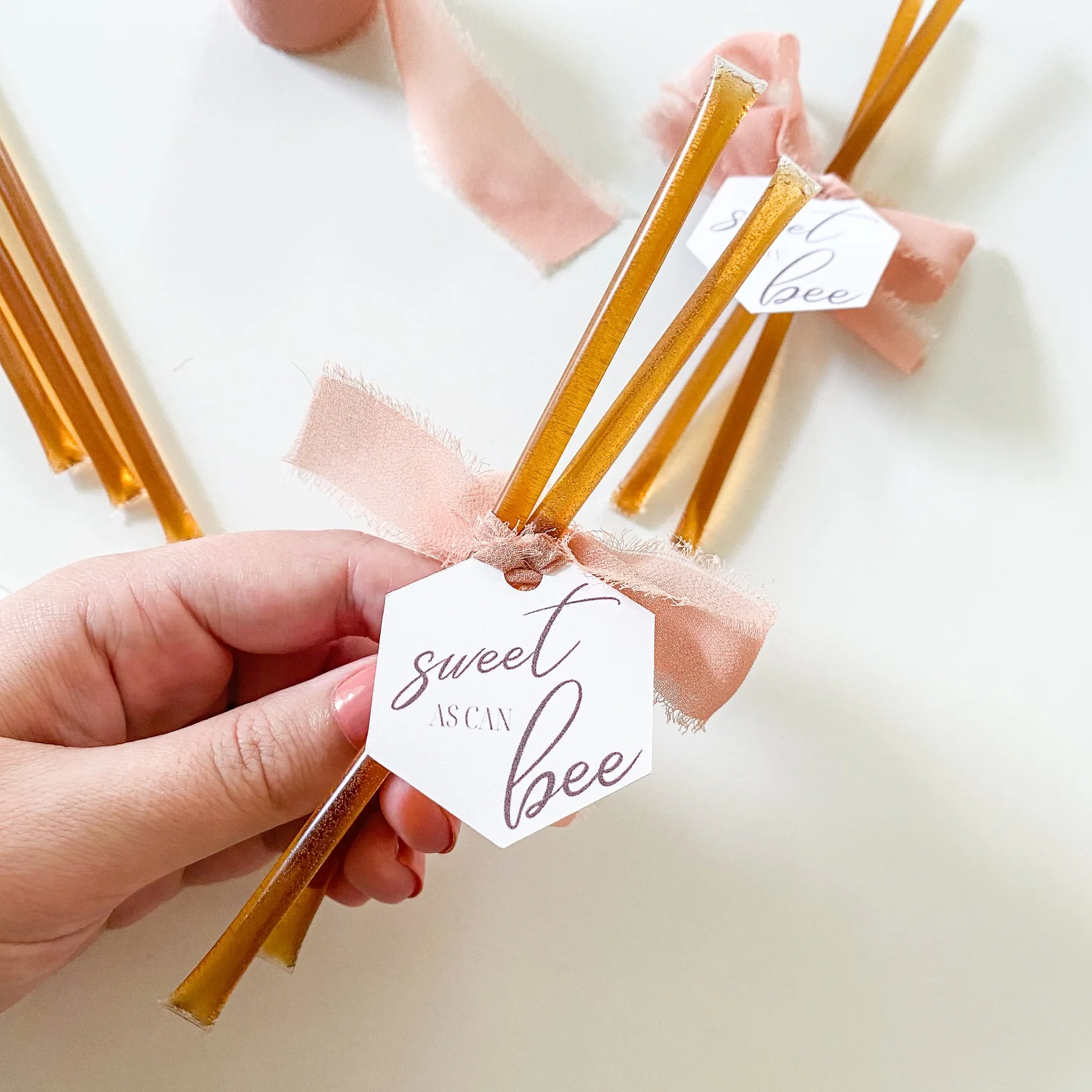 DIY Ribbon Tied Honey Stick Favors with Hexagon Tags β Wine & Sprinkles