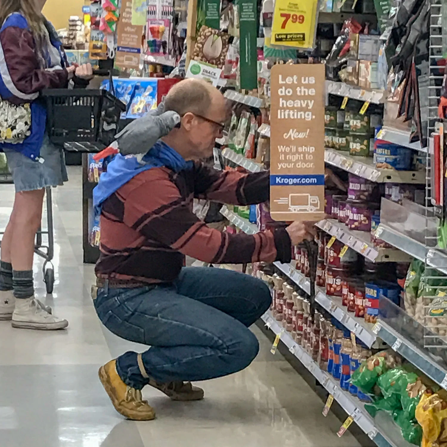 Guy with a gross bird on each shoulder in Kroger