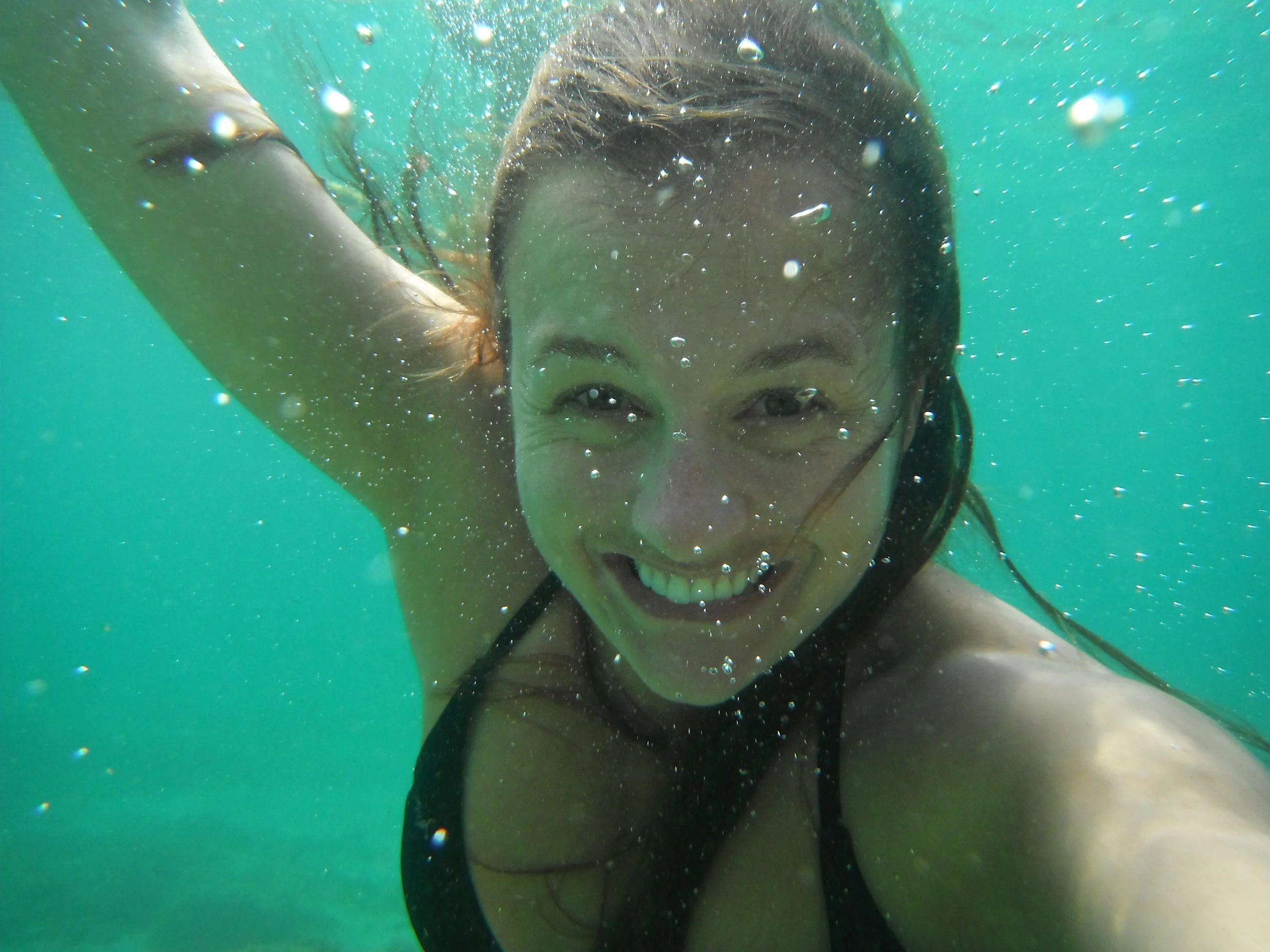  Because the water was so clear, we invested in a cheap, underwater camera. &nbsp;Most pictures are blurry, but some do turn out well. &nbsp;    