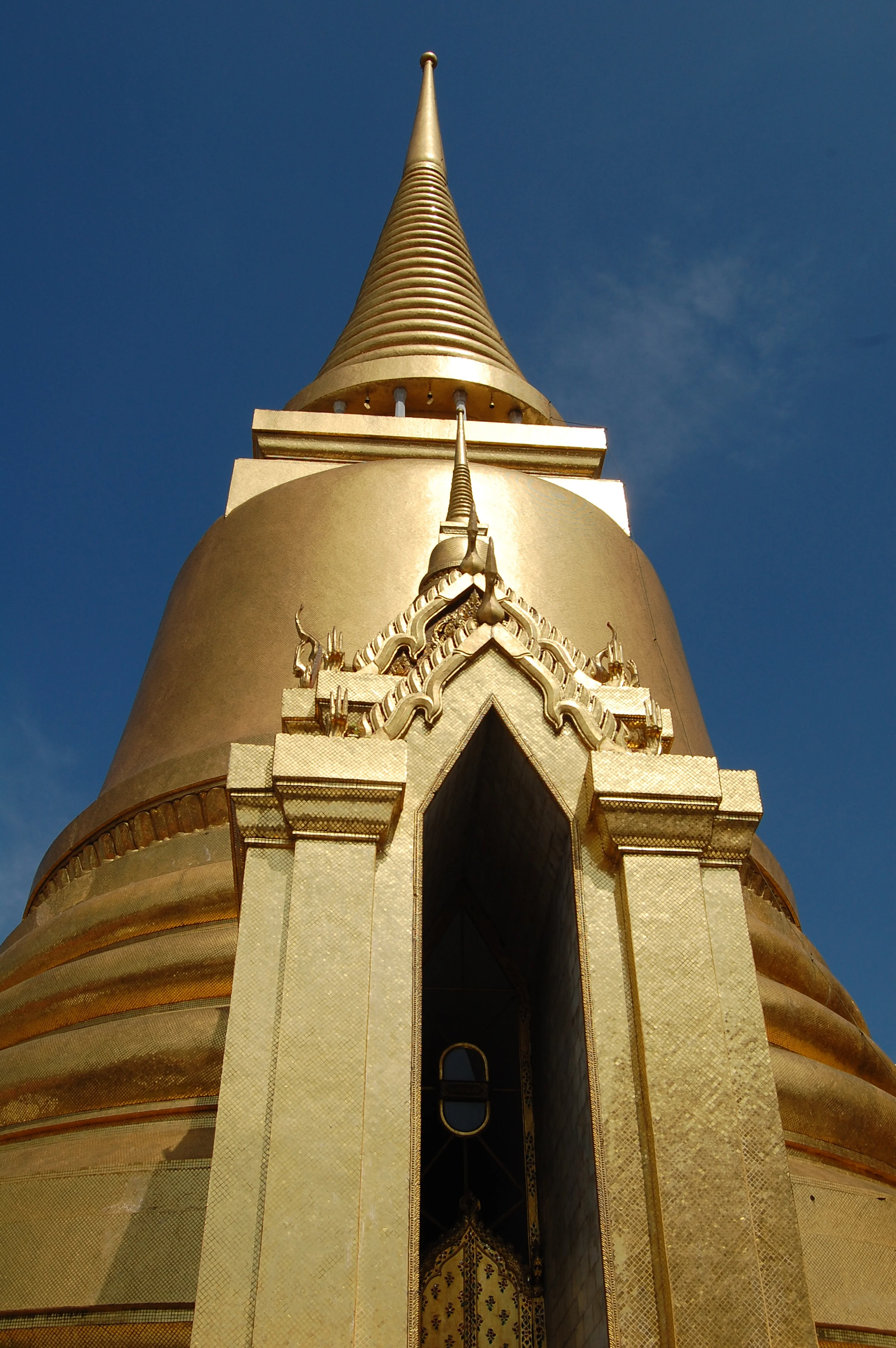  The Temple of the Emerald Buddha,  Wat Phra Kaew, &nbsp;is located inside the Grand Palace and is regarded as the most sacred Buddhist temple. &nbsp;They're very strict on no photos of the Emerald Buddha, which is carved out of a single jade stone. 