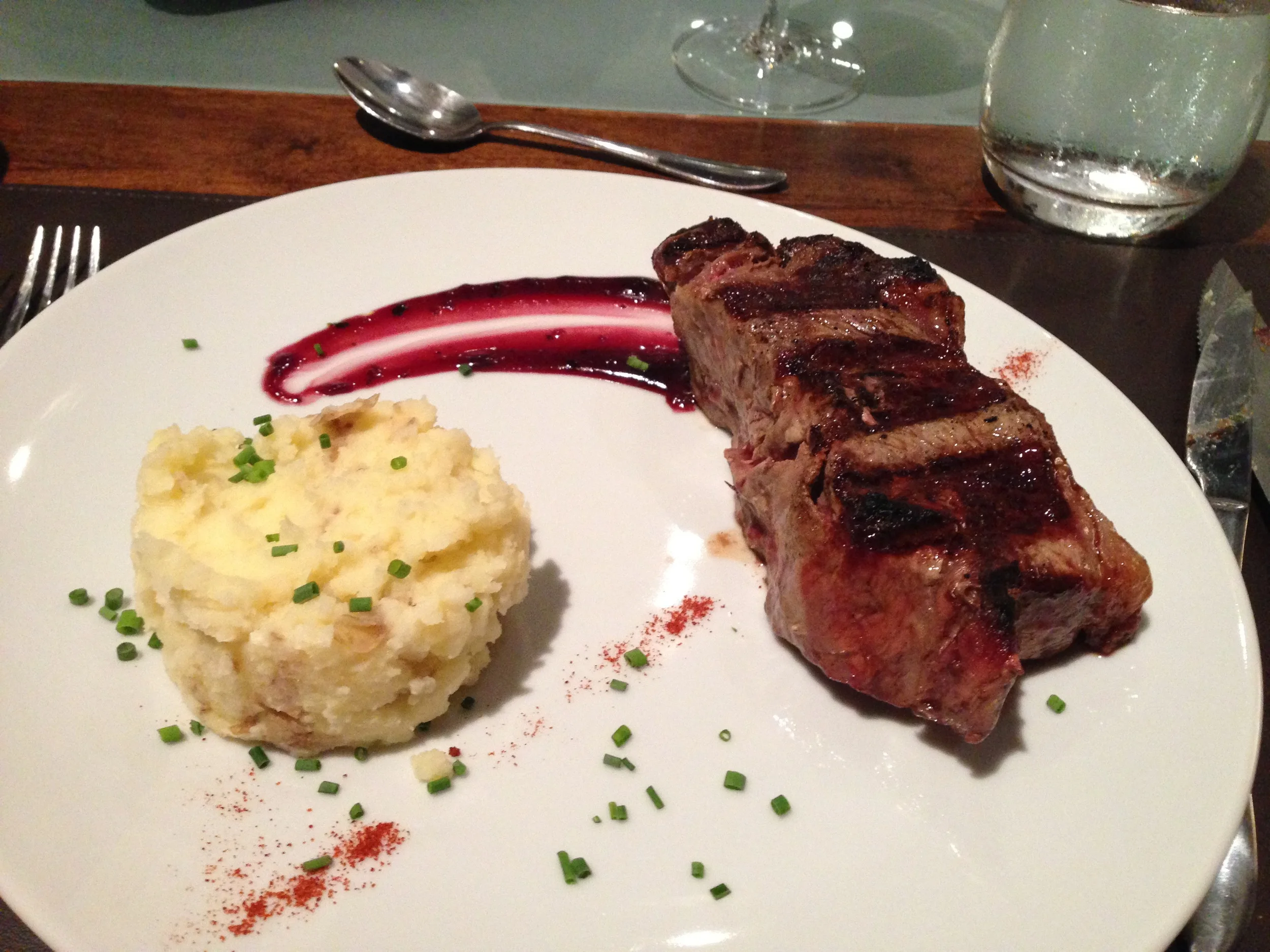  The main event was the steak. &nbsp;Luis, the chef, gets all his meat from a local farmer and cooks it asado-style right in front of you. &nbsp;You eat together&nbsp;at a long banquet table while Luis speaks with each guest individually. &nbsp;Overa
