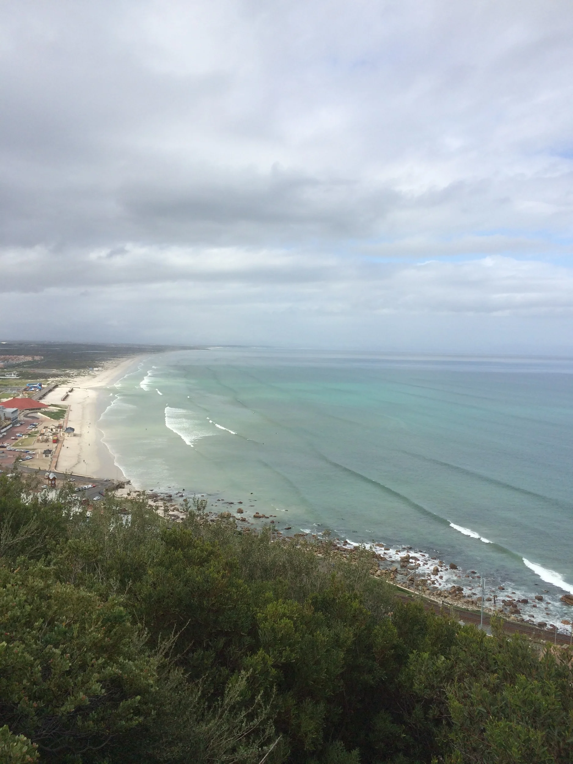  If you're a surfer, I've got one word for you:  Muizenberg . &nbsp;The most amazing sets come rolling in non-stop. &nbsp;Had my quads not been torn to pieces from Table Mountain and had I known about this town, I would've spent a few nights here and