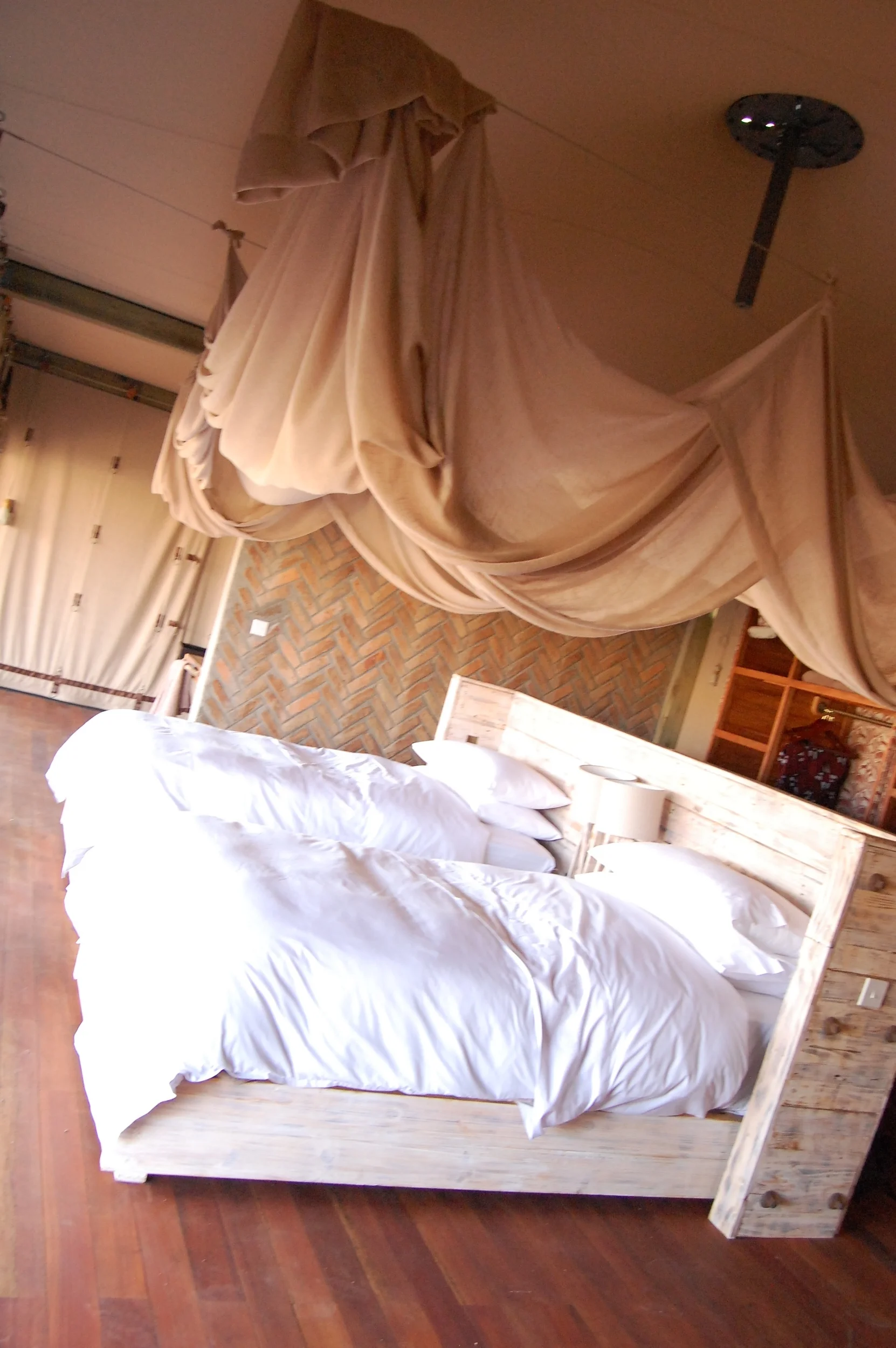  Think, Four Seasons in the middle of the bush...&nbsp;Except the only thing that separates you from the wild animals is a thin canvas. &nbsp; 