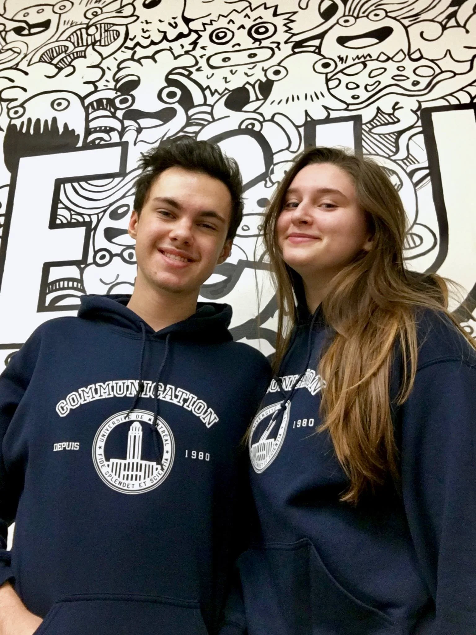 Yllan et Mathilde sont confiants. Ils portent aussi les nouveaux chandails maintenant disponibles à l'asso!
