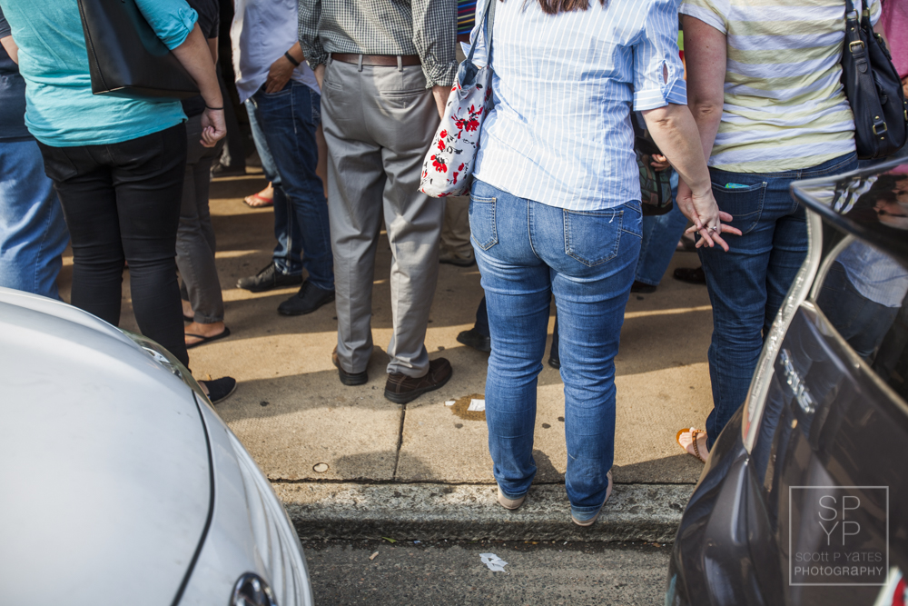 Two women hold hands outside the Byrd Theatre after a press conference celebrated the Supreme Court's decision to legalize same-sex marriage in all 50 states.