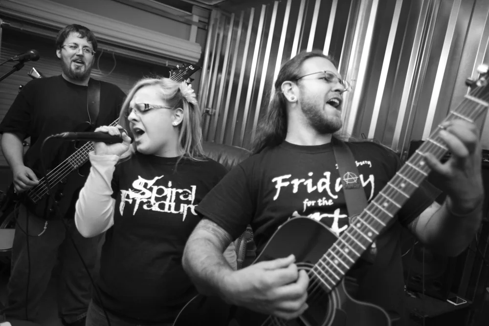 From left, Drew, Shannon, and Eric are three of the five members of Miss Daisy and the Toad Hunters. Photographed in their band's practice space in Colonial Heights, Va., earlier this year.