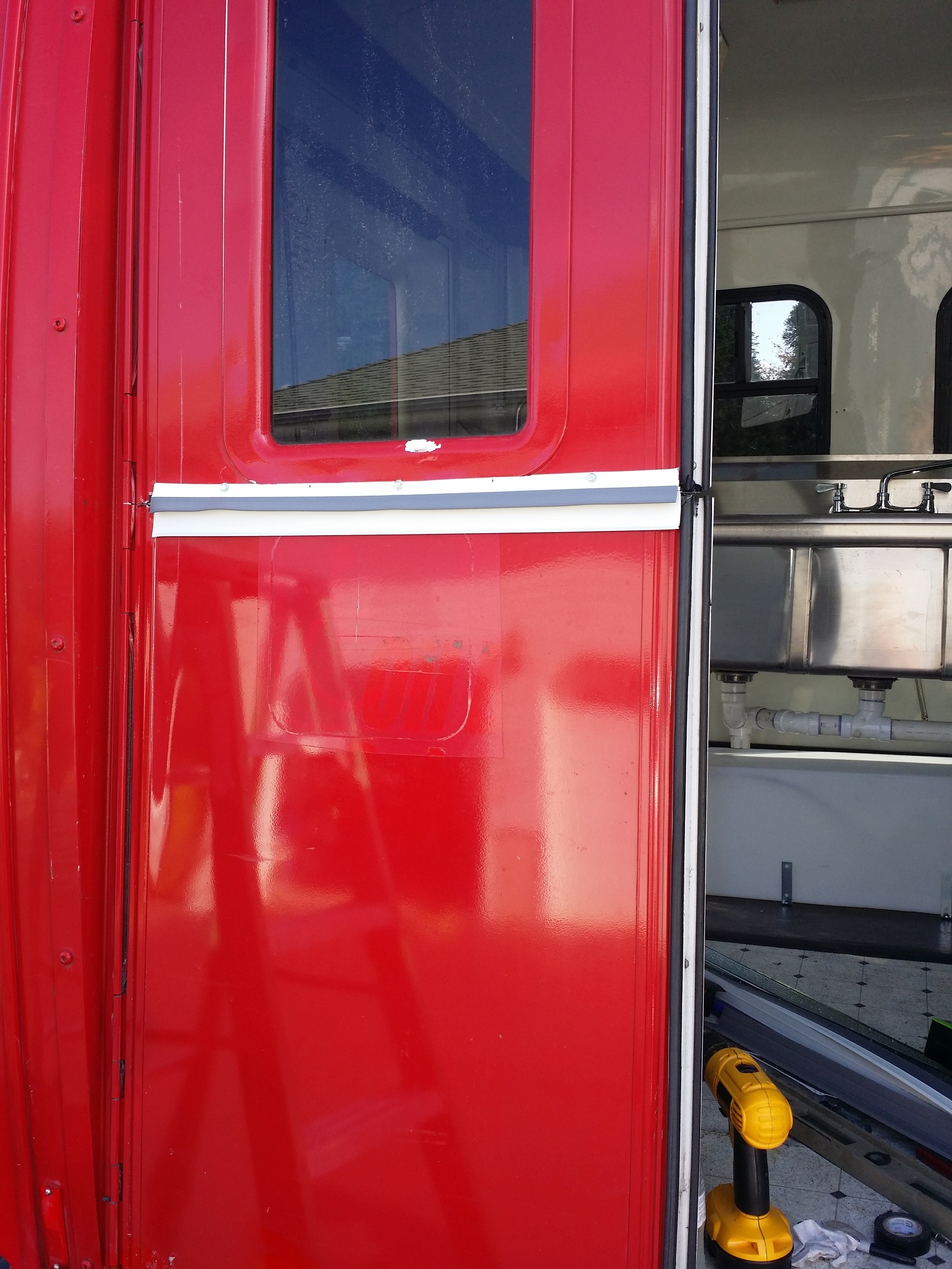 Putting the trim on the window