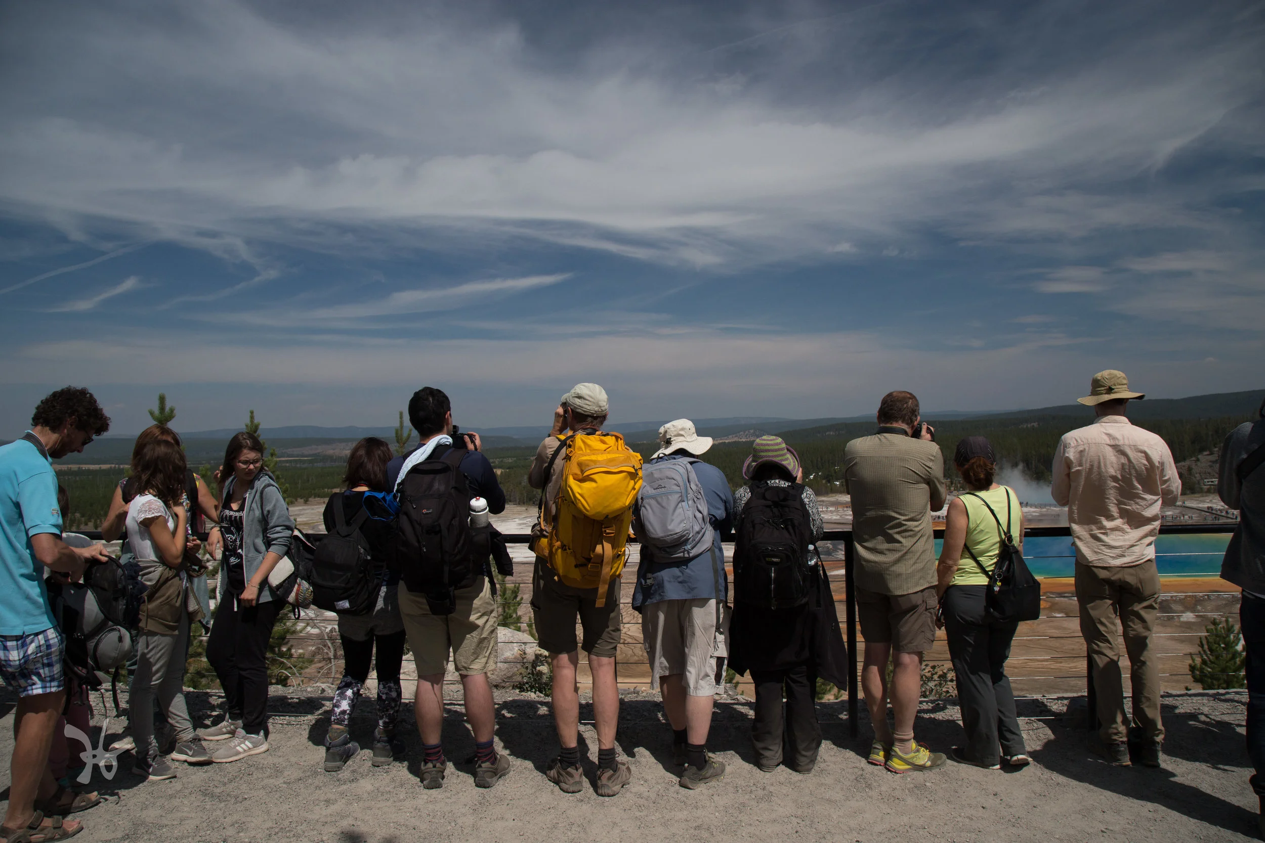 spectators take in the Grand Prismatic Spring