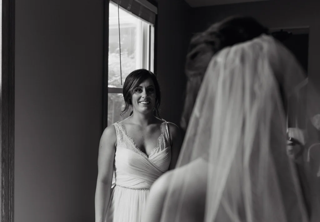 Brides first look with sister.