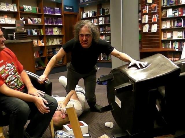 Jasper deals with a heckler at a public reading.