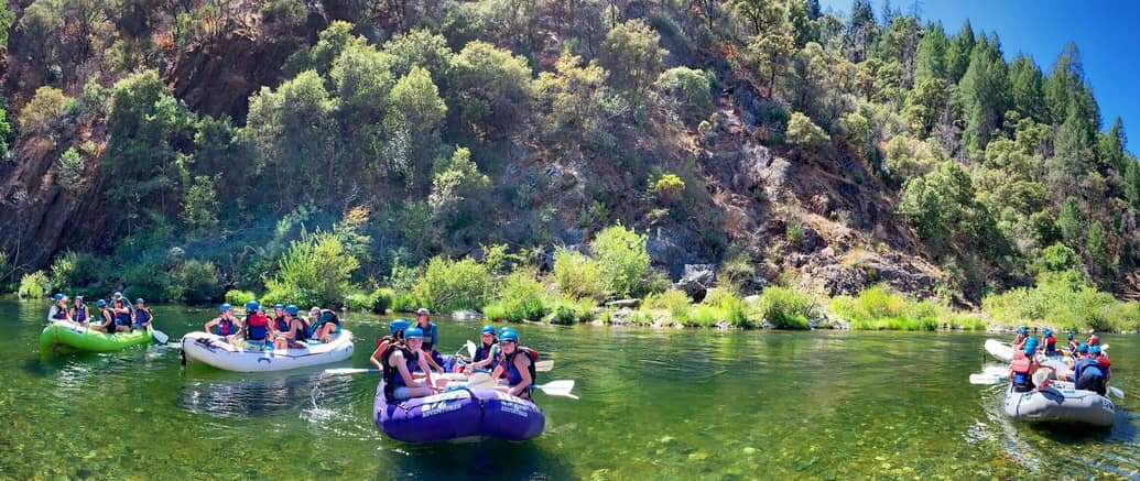 3 groups of people White Water Rafting in California.jpg