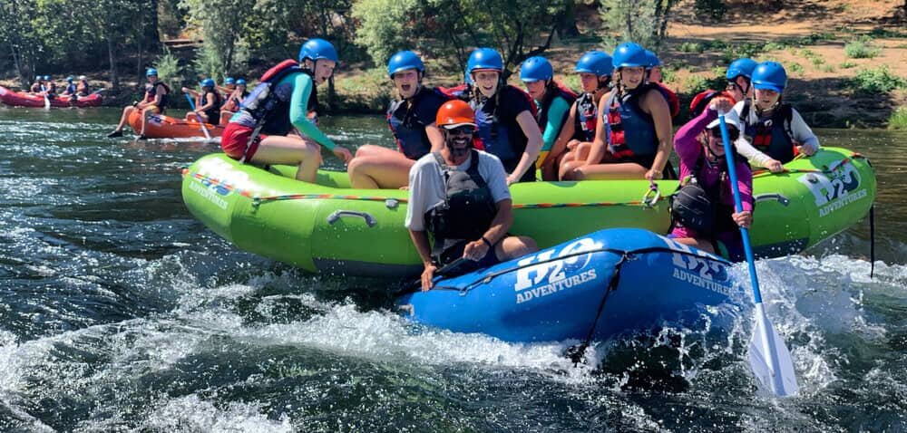 A group of people White Water Rafting in California.jpg