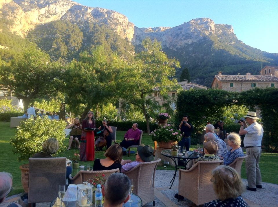  With Anne Hills performing in Deia, Mallorca with a string quartet. With the Tramuntana mountain range in the background. July 2014. 