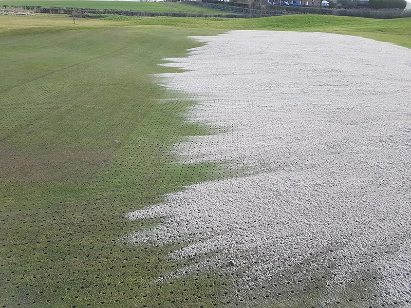 Topdressing of greens once hollow cored