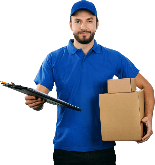 A delivery person wearing a blue uniform holding two brown boxes and a clipboard with documents.