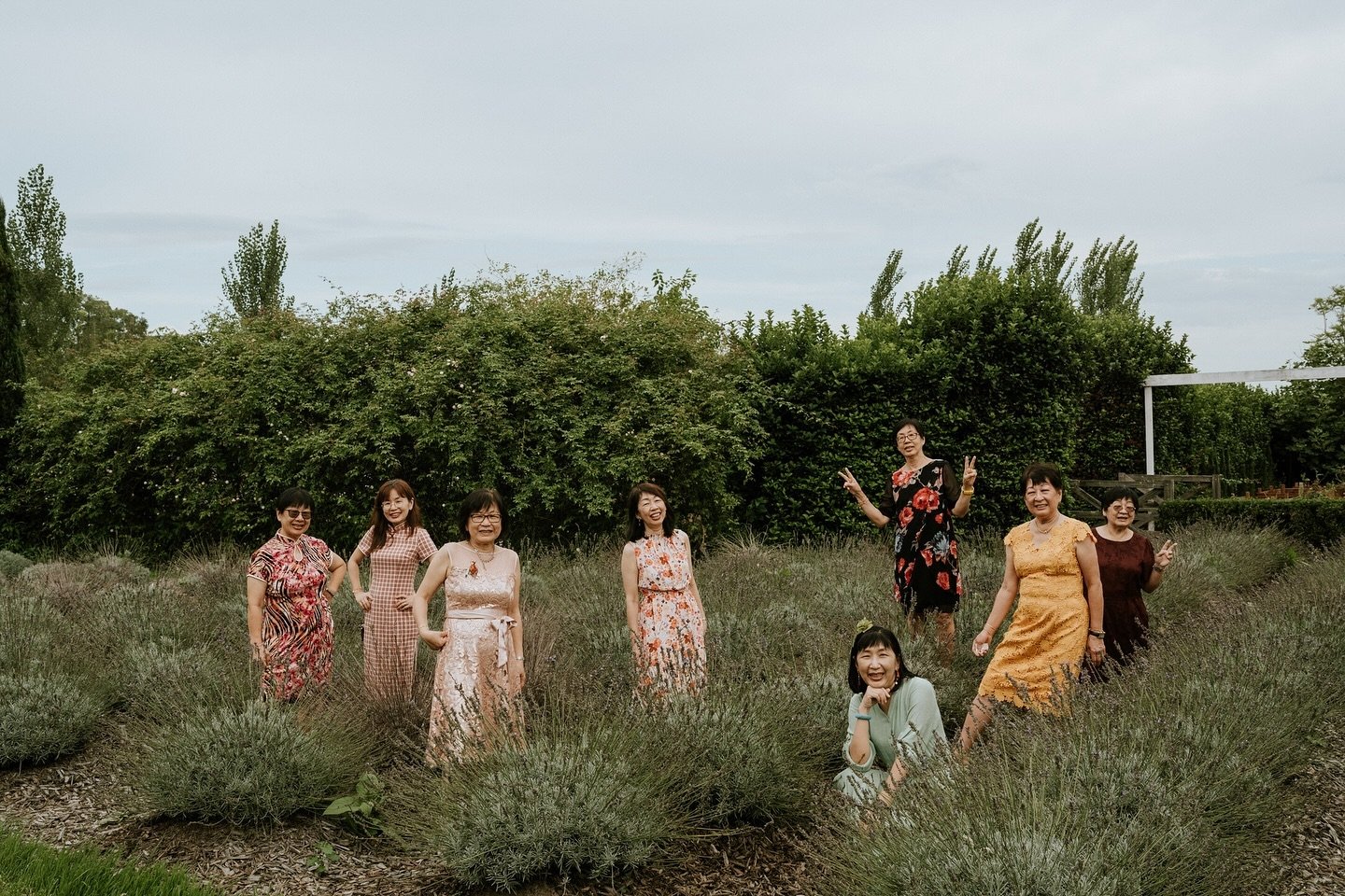Family. Where would we be without them? 
Mish and Leong&rsquo;s families came from all around the world.
8 sisters, who haven&rsquo;t been gathered together for a while standing in a field like wildflowers, special moments in time for not only Mish a