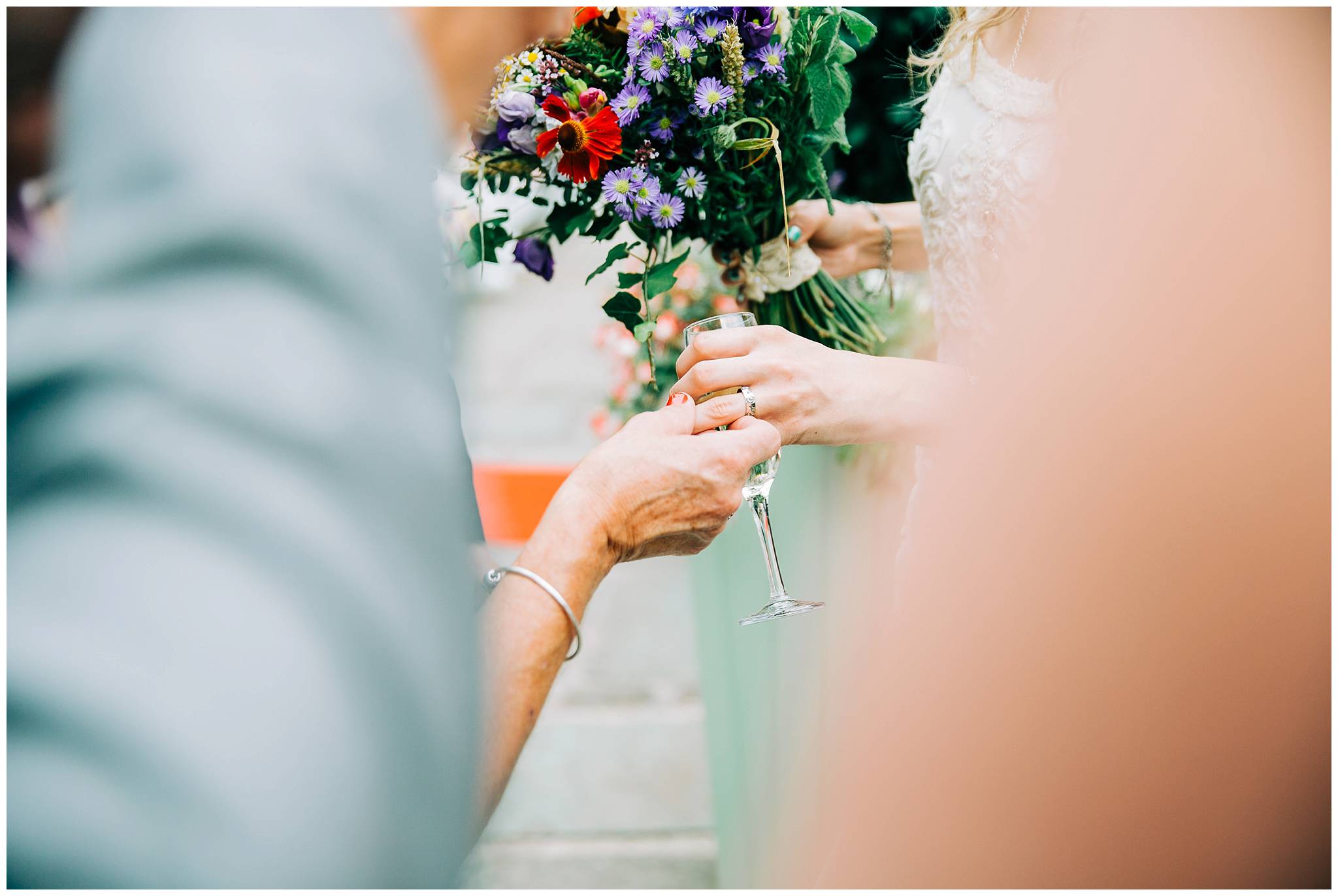 guest is looking at brides vintage wedding ring