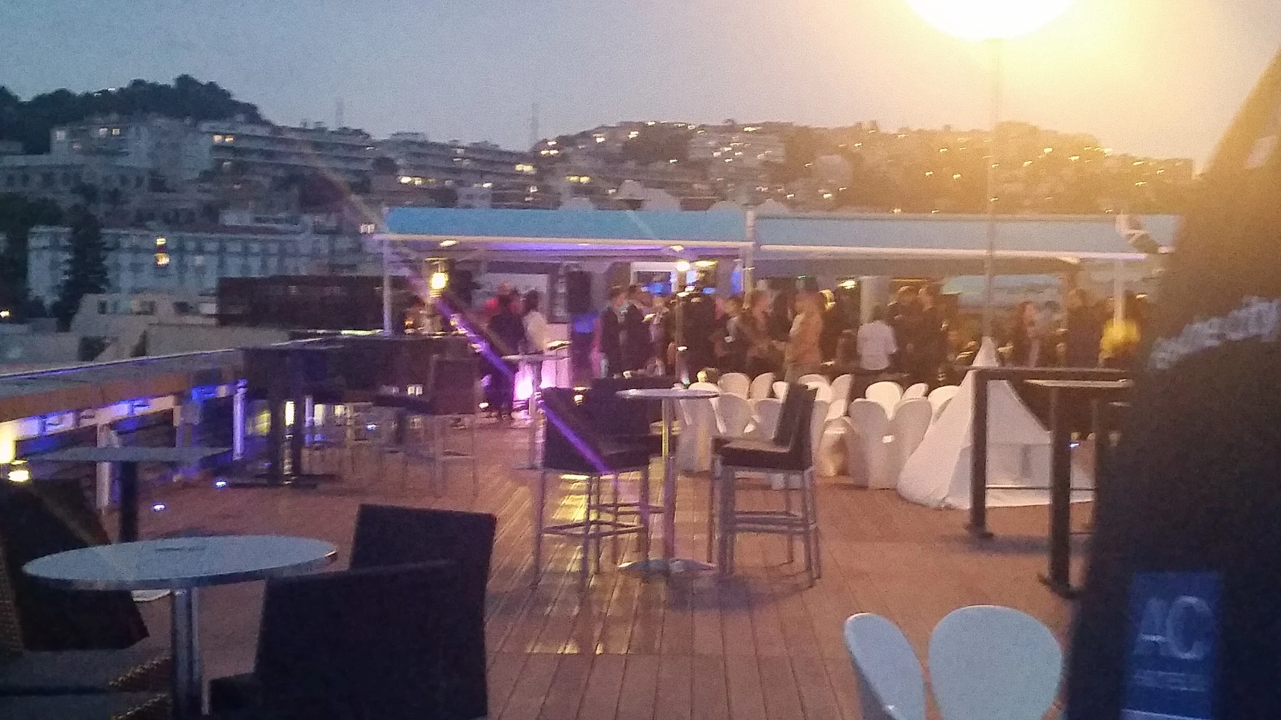 We snuck up to the roof to get a pic. A band, a photo booth, funky lights and a saxophone.