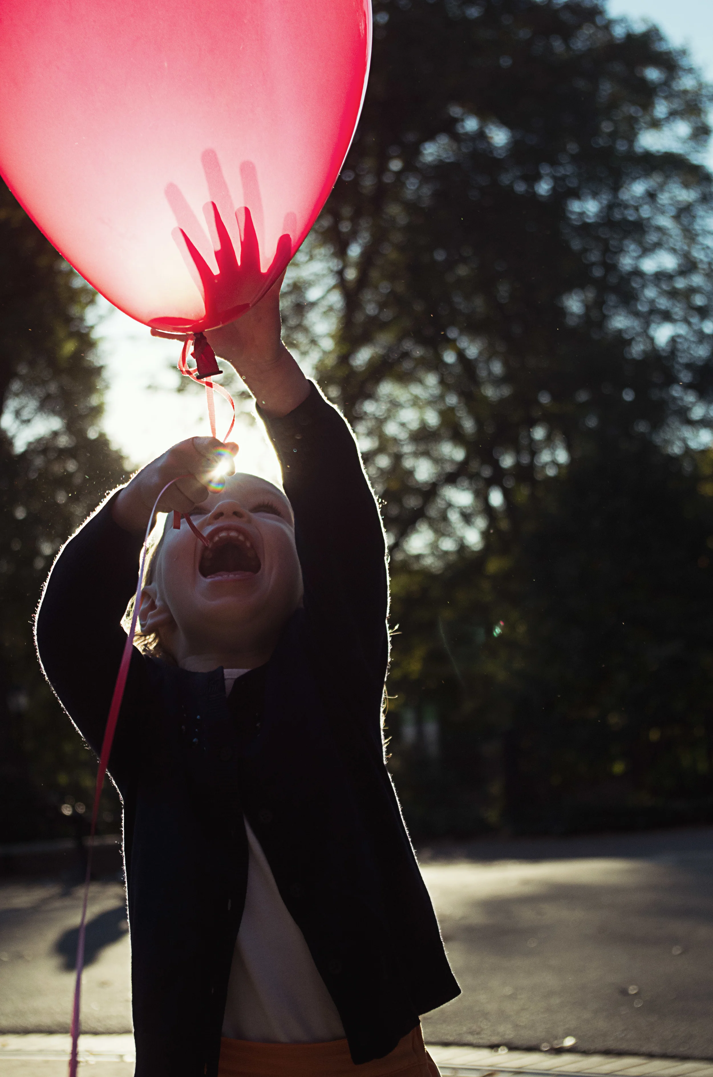 On Friday, I shot some family portraits for the Griffin family. I brought Charlotte a balloon and after warming up to it a bit, she couldn't get enough. There were lots of really great photos from the day, but this is probably my favorite capture.