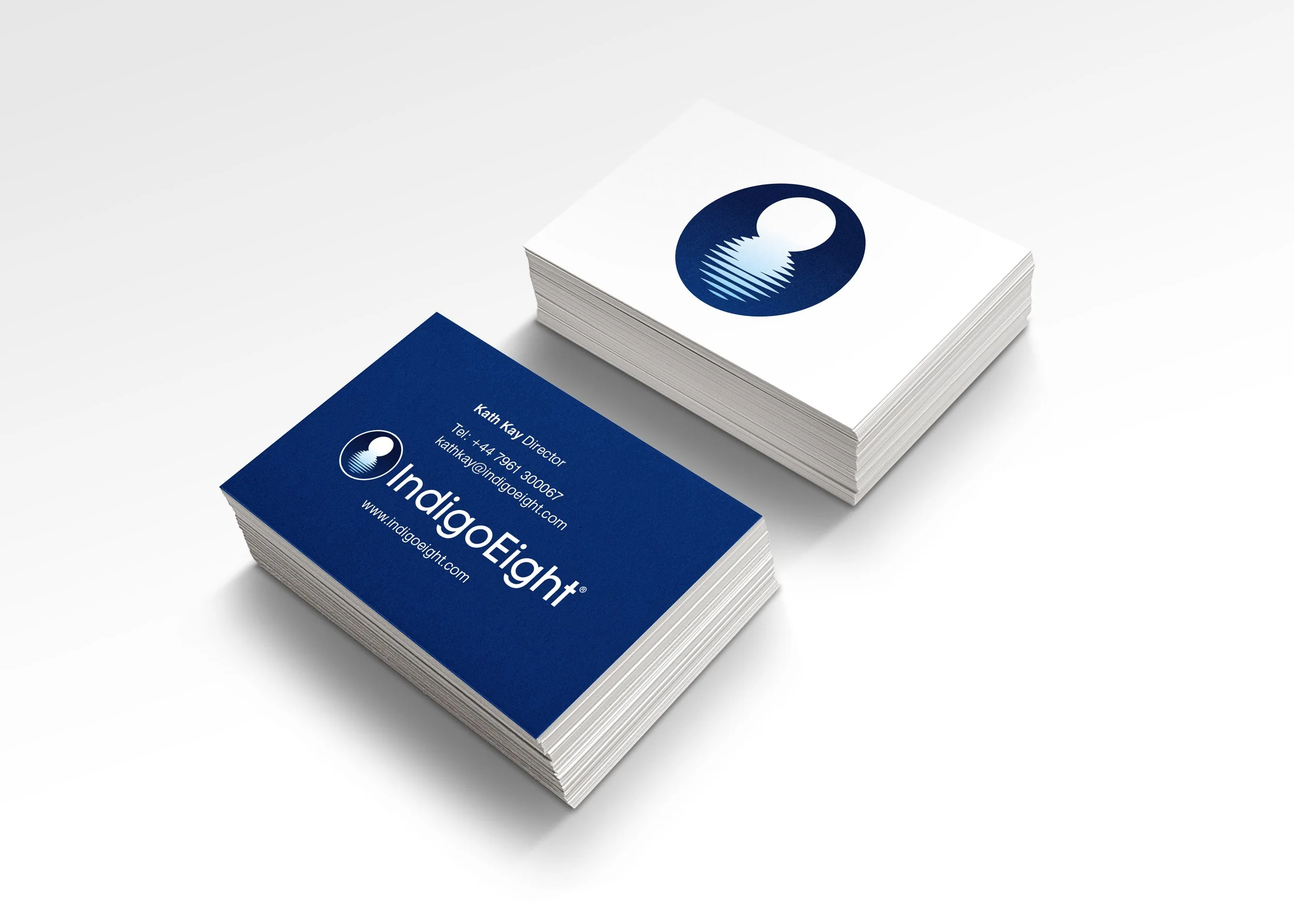 IndigoEight business cards on a white background.