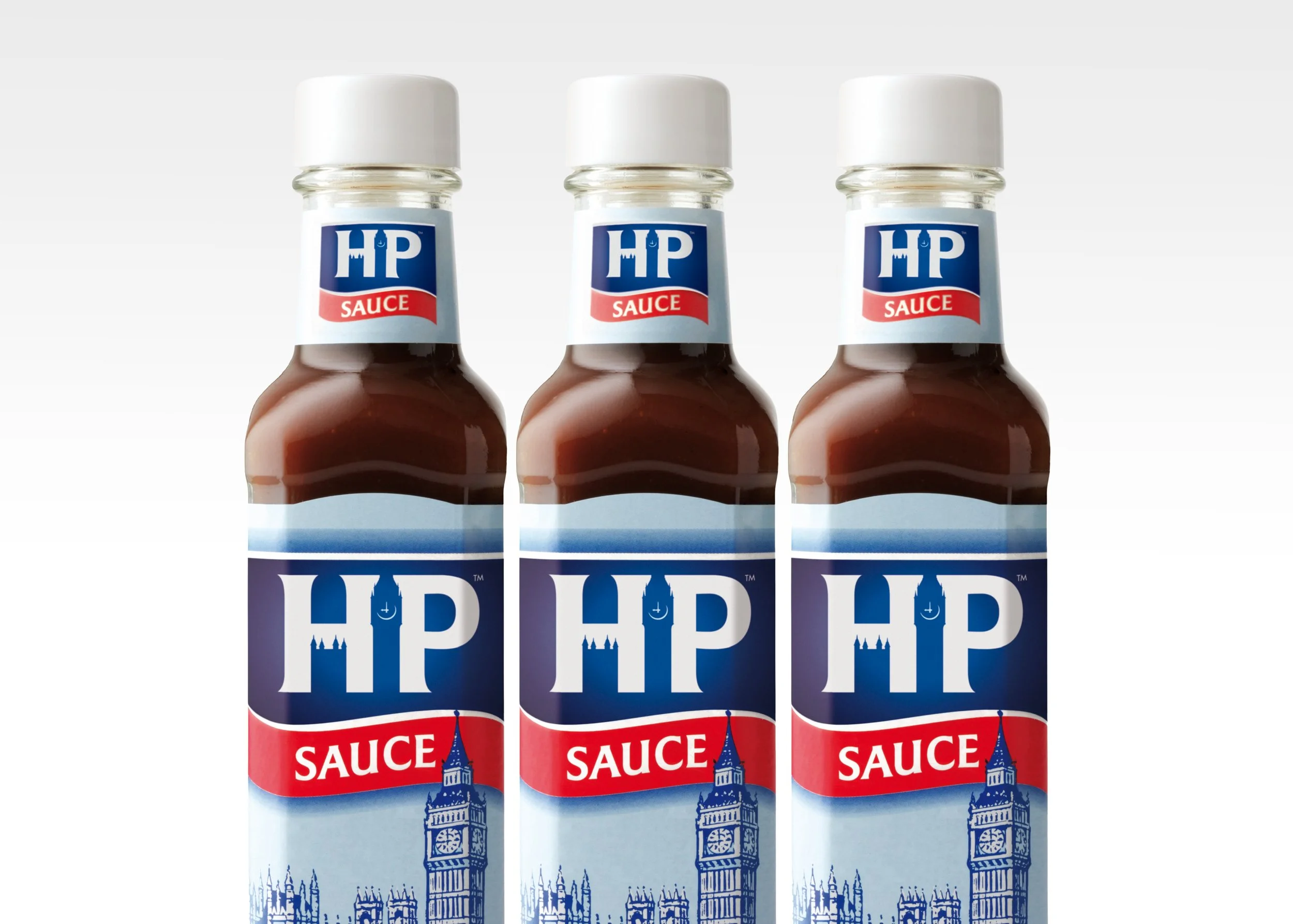 3 Bottles of HP Sauce with the new HP branding, on a white background.